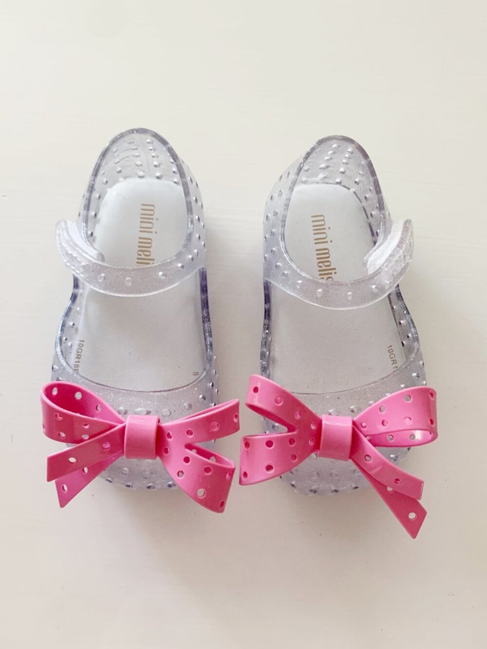 Mini Melissa Ultragirl Flats • Clear / Silver with Pink Bows • Infant Size 5